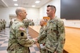 U.S. Army Staff Sgt. Timothy Edner (right), a Basic Leader Course senior facilitator with the 166th Regiment – Regional Training Institute, receives the Army Achievement Medal from Lt. Col. Gordon Kinneer, the regiment’s deputy commanding officer, during a ceremony at Fort Indiantown Gap, Pennsylvania, July 28, 2026. Edner was recognized for his contributions to the 166th Regiment’s Noncommissioned Officer Academy and Basic Leader Course. (U.S. Army National Guard photo by Sgt. 1st Class Shane Smith)
