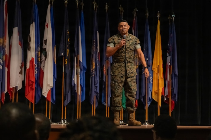 U.S. Marine Corps Col. Javier A. Garcia, incoming commanding officer of Wounded Warrior Regiment, delivers remarks after taking command during the WWR change of command ceremony held at Marine Corps University’s Warner Hall on Marine Corps Base Quantico, Virginia, July 15, 2026. The ceremony signifies the transfer of command from Col. Morina D. Foster, the outgoing commanding officer of WWR, to Garcia and the continuation of the unit’s mission to serve recovering service members. (U.S. Marine Corps photo by Lance Cpl. Daniel Y. Ruizdelgado)