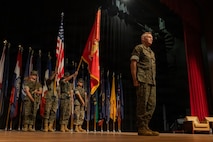 U.S. Marine Corps Lt. Gen. William J. Bowers, deputy commandant for Manpower and Reserve Affairs, assumes his position in front of the reviewing area during the Wounded Warrior Regiment change of command ceremony held at Marine Corps University’s Warner Hall on Marine Corps Base Quantico, Virginia, July 15, 2026. The ceremony signifies the transfer of command from Col. Morina D. Foster, the outgoing commanding officer of WWR, to Col. Javier A. Garcia, the incoming commanding officer, and the continuation of the unit’s mission to serve recovering service members. (U.S. Marine Corps photo by Lance Cpl. Daniel Y. Ruizdelgado)
