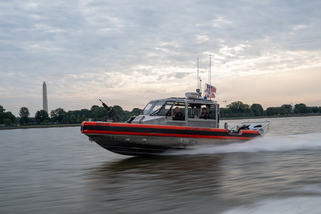 A Coast Guard 29-foot Response Boat-Small (RB-S) boat from Station Washington conducts operational maneuvers during a capabilities demonstration on the Potomac River, Aug. 20, 2026. The evolution showcased the crew’s ability to support missions across the National Capital Region. (U.S. Coast Guard photo by PA3 Austin Canos)
