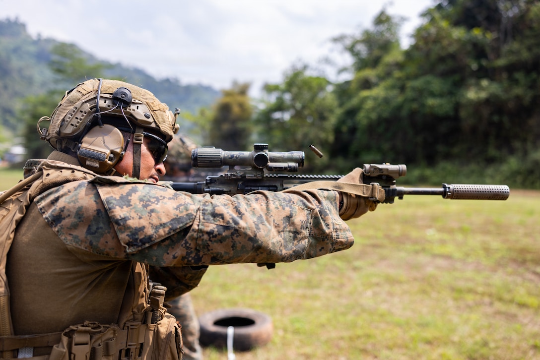 U.S. Marine Corps Sgt. Brandon Rivera, a squad leader with Alpha Company, 1st Battalion, 5th Marine Regiment, Marine Rotational Force – Darwin 26, fires an M27 infantry automatic rifle during a live-fire range as part of a platoon exchange at the Indonesian Marine Corps 9th Battalion near Lampung, Indonesia, Aug. 21, 2026. This year’s iteration of the annual platoon exchange is between MRF-D and the Indonesian Armed Forces 7th Infantry Battalion, 4th Brigade, designed to enhance combined combat readiness, strengthen tactical interoperability, and reinforce the enduring partnership between both nations. Rivera is a native of Texas. (U.S. Marine Corps photo by Sgt. Kyle Chan)