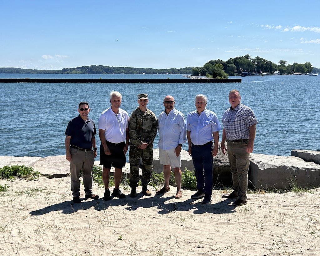 Lt. Col. Aaron Anderson, commander of the U.S. Army Corps of Engineers, Buffalo District, toured the completed East Breakwater and West Pier projects and met with local stakeholders in Sodus Point, New York, on July 31, 2026, during an Area of Responsibility (AOR) tour alongside project delivery team members, including Resident Engineer Shawn Foster. The visit provided an opportunity to see completed infrastructure improvements firsthand, hear directly from local partners about their impact, and reinforce the Buffalo District's commitment to delivering projects that support safe navigation, strengthen coastal communities, and build lasting relationships with those it serves. (U.S. Army photos by Kaylee Wendt)