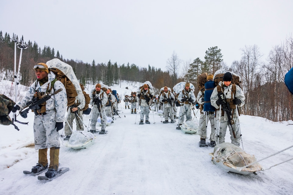U.S. Marines with 1st Battalion, 2nd Marine Regiment, 2nd Marine Division; and Bravo Battery, 2nd Low Altitude Air Defense (LAAD) Battalion, 2nd Marine Aircraft Wing, conduct a snowshoe hike in preparation for Exercise Nordic Response 24 at Setermoen, Norway, Jan. 29, 2024. Exercise Nordic Response, formerly known as Cold Response, is a NATO training event conducted every two years to promote military competency in arctic environments and to foster interoperability between the U.S. Marine Corps and allied nations. (U.S. Marine Corps photo by Cpl. Christopher Hernandez)
