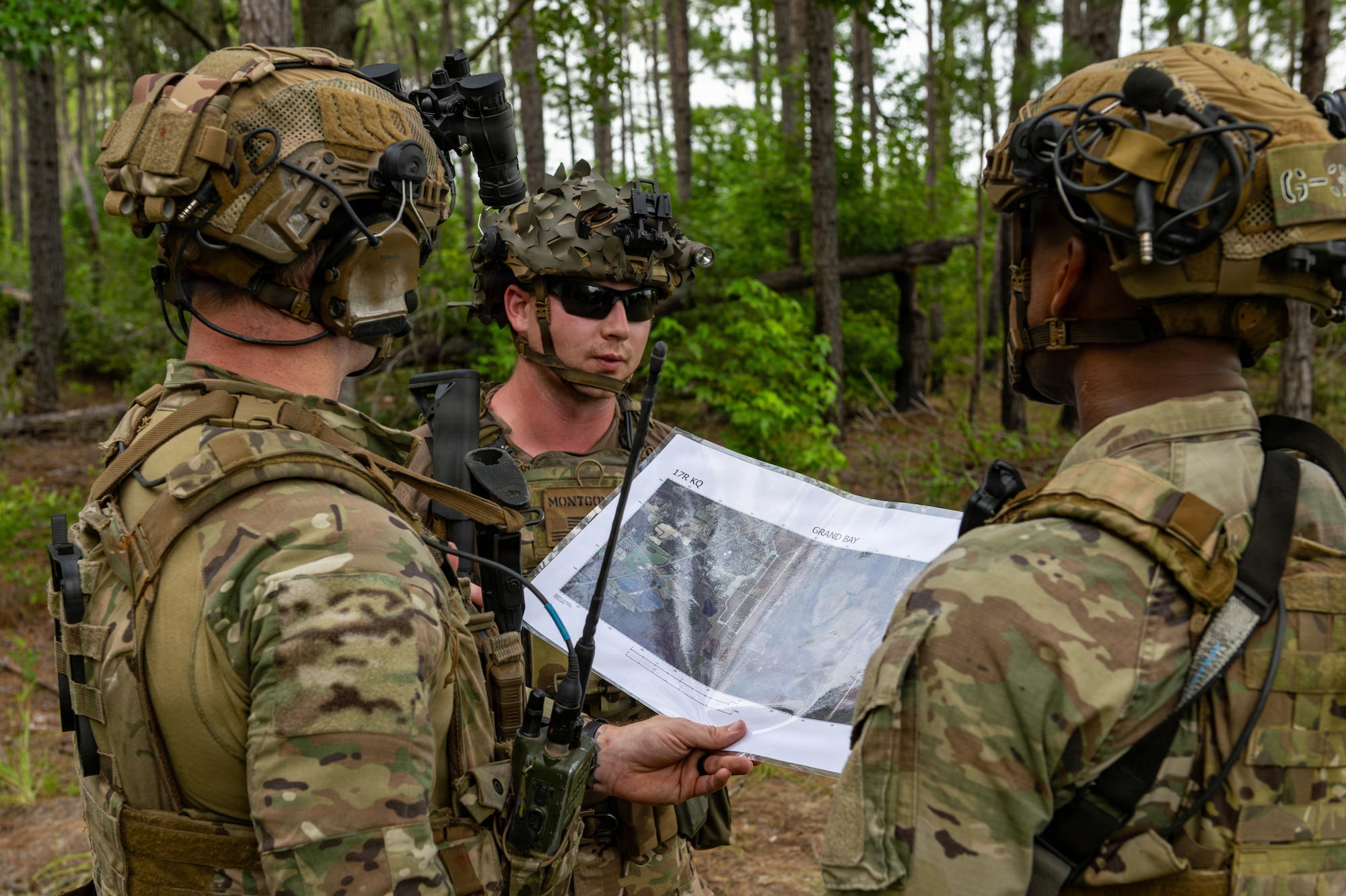 Airmen looking at a map.