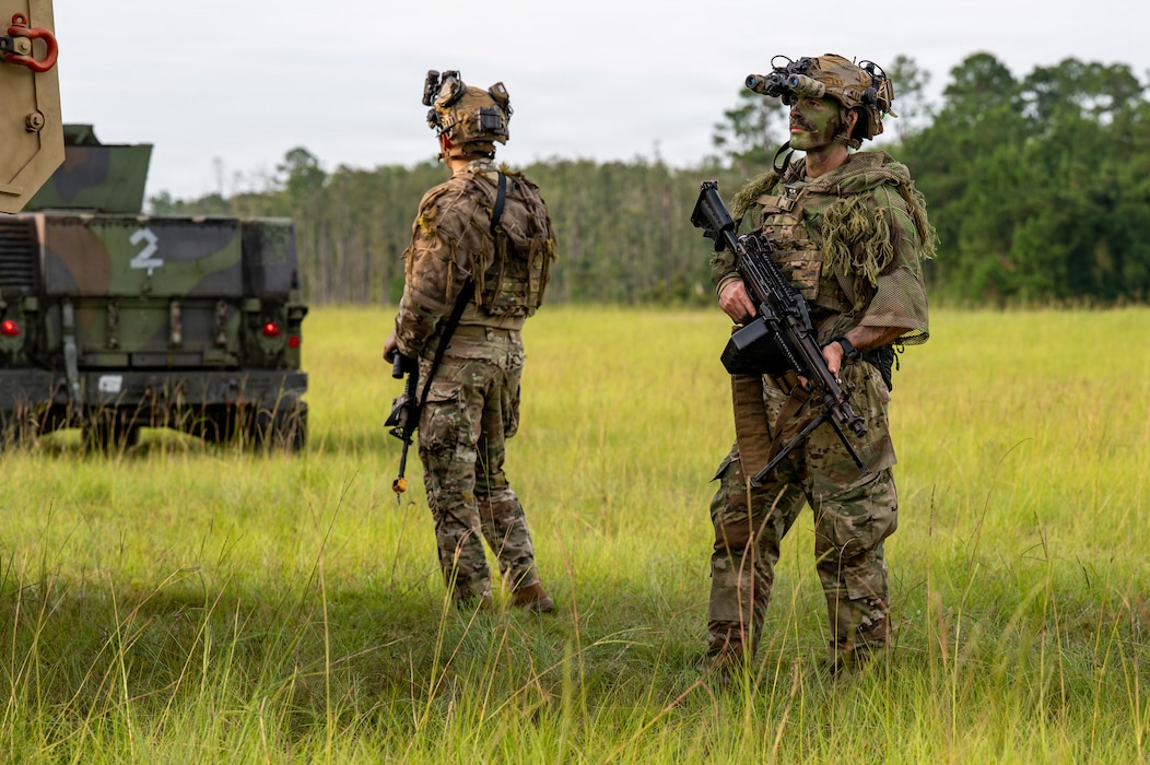 Airmen standing guard.