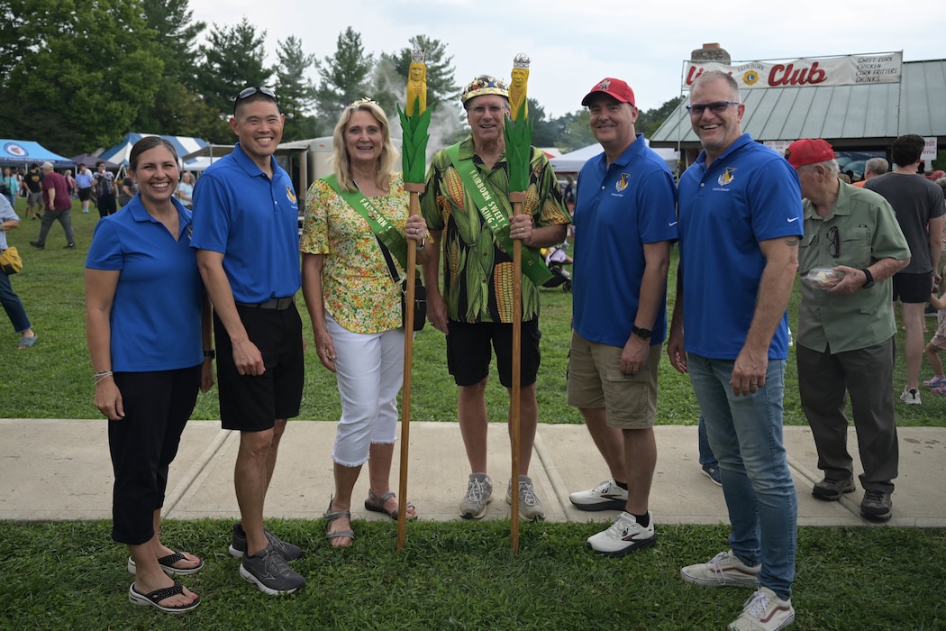 Leadership from the 88th Air Base Wing poses for a photo with the 2026 Fairborn Sweetcorn Festival King and Queen, Alan and Dottie Meade, during the 44th Annual Fairborn Sweet Corn Festival at Community Park in Fairborn, Ohio