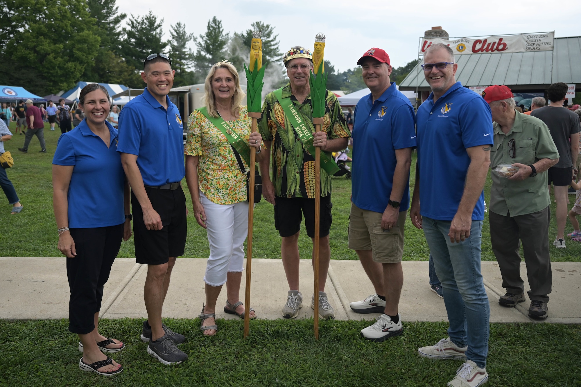 Leadership from the 88th Air Base Wing poses for a photo with the 2026 Fairborn Sweetcorn Festival King and Queen, Alan and Dottie Meade, during the 44th Annual Fairborn Sweet Corn Festival at Community Park in Fairborn, Ohio