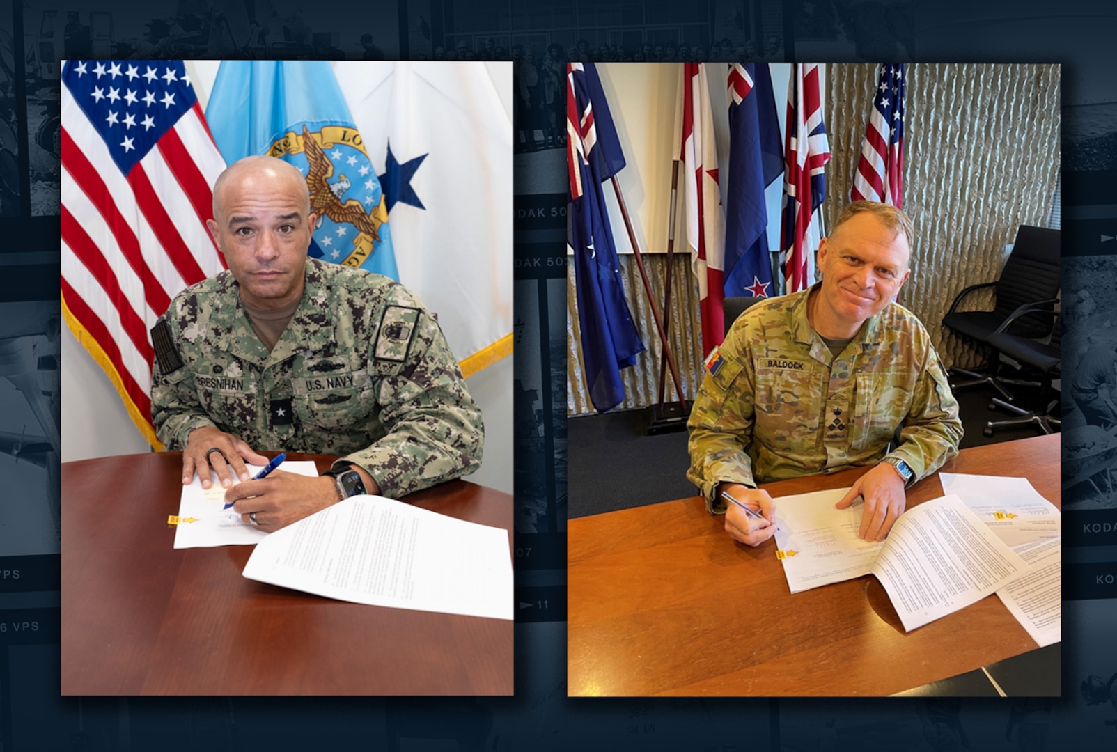 Two men signing papers.