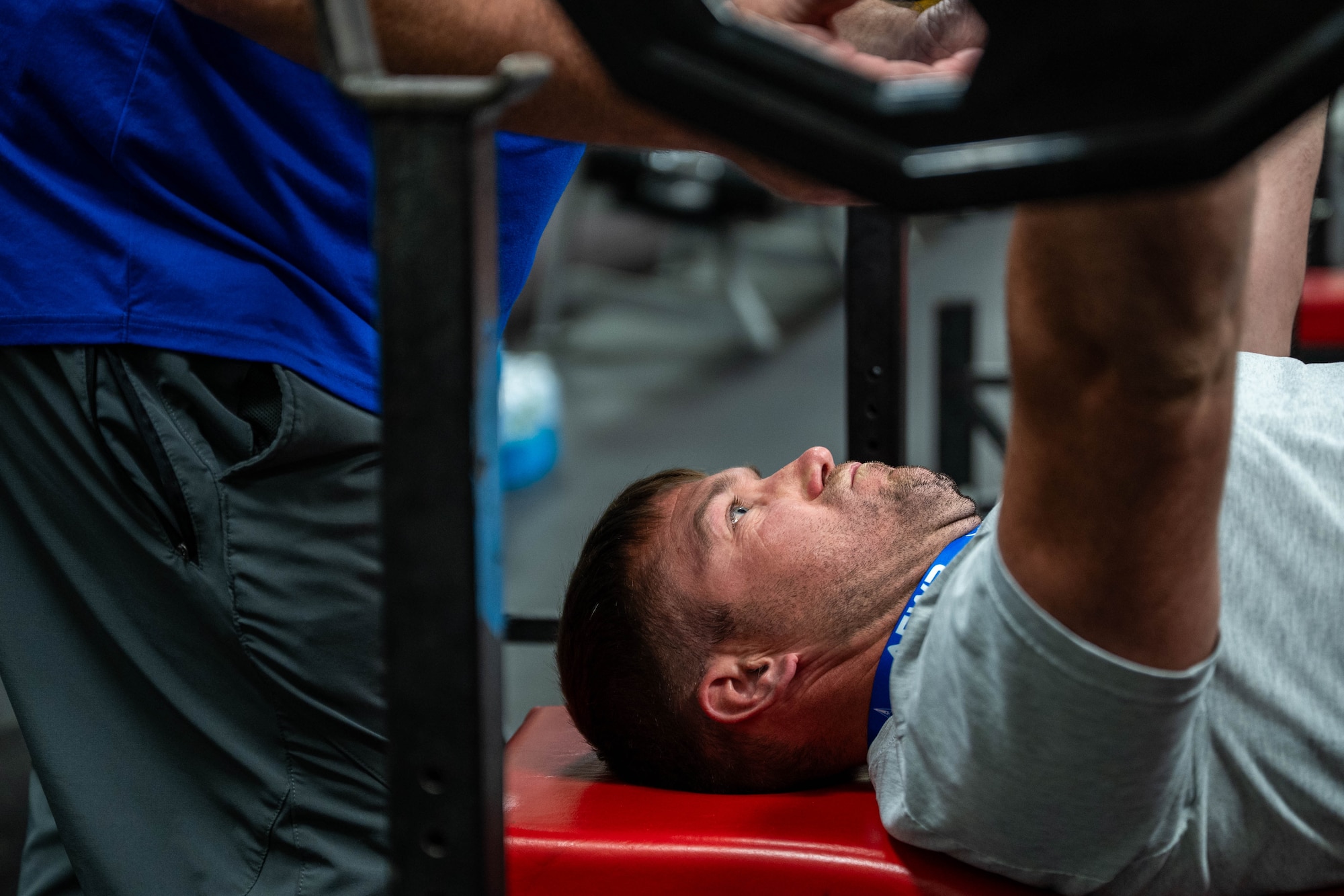A man bench presses