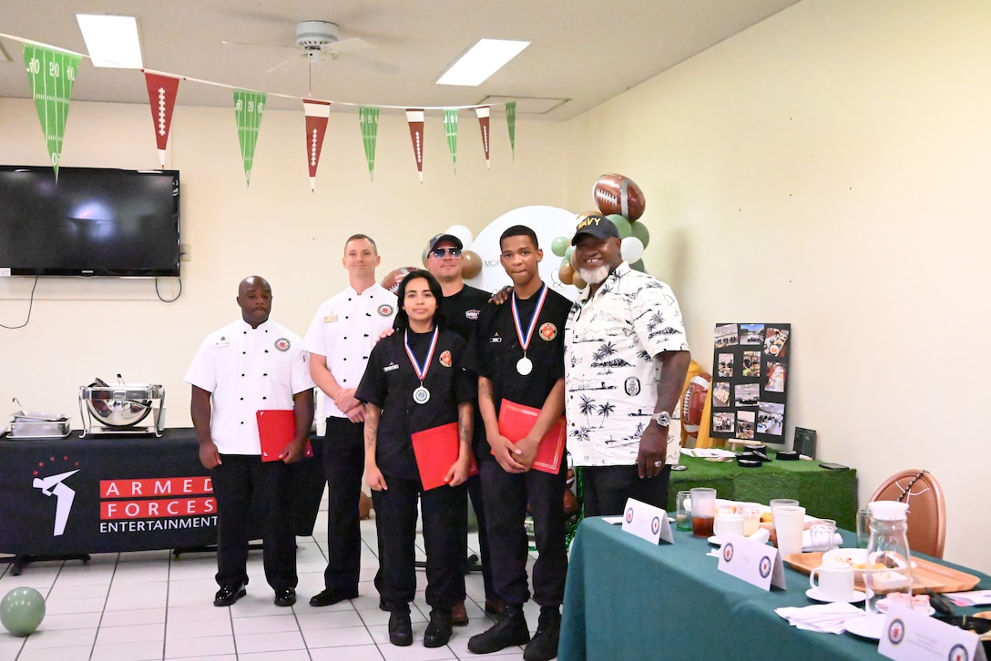 Marine Corps Base Hawaii's team poses for photo after earning second place during the fourth quarter fiscal year Marine Corps Installations Pacific Food Services Specialist of the Quarter competition at Combined Arms Training Center, Camp Fuji, August 19, 2026. (U.S. Marine Corps photo by Song Jordan)