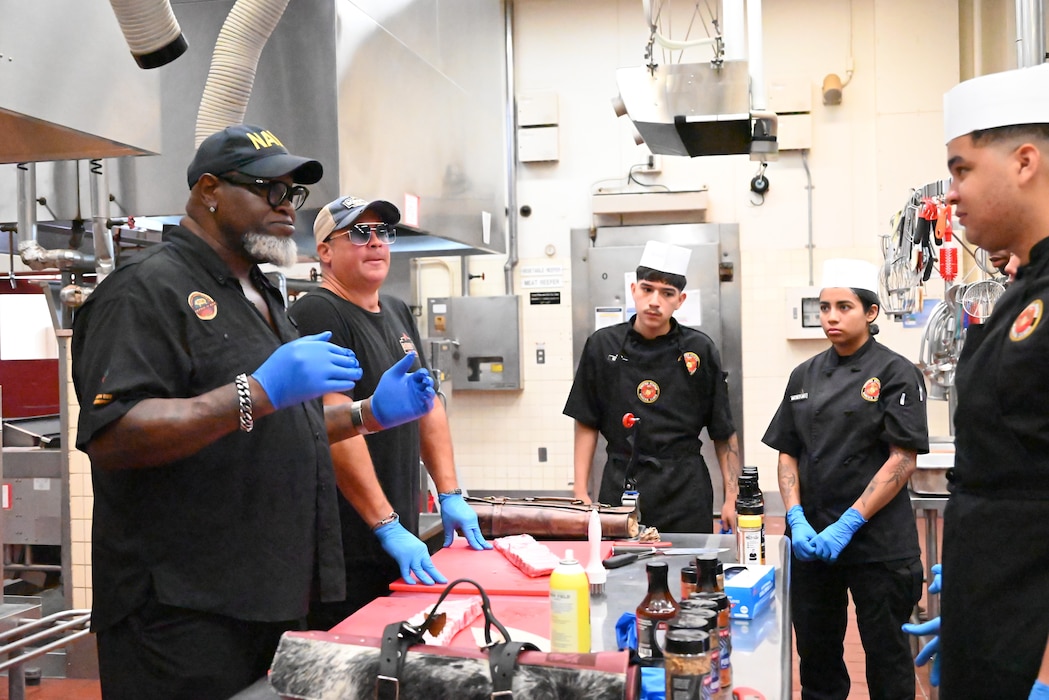 Celebrity barbecue pit masters teach Marines.
