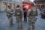 Louisiana National Guard Soldiers assigned to Task Force NOLA speak with members of the public after responding to a possible medical emergency in the French Quarter in New Orleans, Aug. 23, 2026. Guardsmen routinely interacted with residents and visitors and responded to requests for assistance throughout nearly eight months of security operations in support of local and state law enforcement partners. The Louisiana National Guard concluded nearly eight months of security operations in New Orleans Aug. 24.