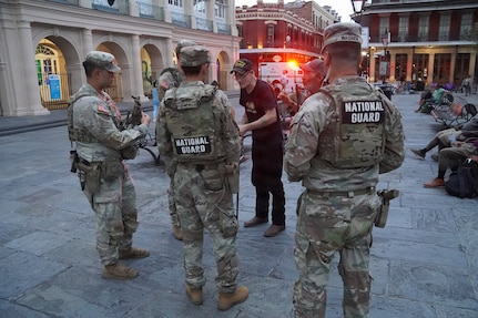Louisiana National Guard Soldiers assigned to Task Force NOLA speak with members of the public after responding to a possible medical emergency in the French Quarter in New Orleans, Aug. 23, 2026.
