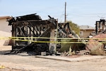 A home in Twentynine Palms, California, shows extensive damage Aug. 24, 2026, following an explosion and fire Aug. 21. Navy hospital corpsmen and Marines responded to the incident, helping rescue two injured residents, evacuate neighboring homes and provide medical assistance until civilian emergency responders arrived. (U.S. Navy photo by Christopher Jones, NH/NMRTC Twentynine Palms public affairs officer).