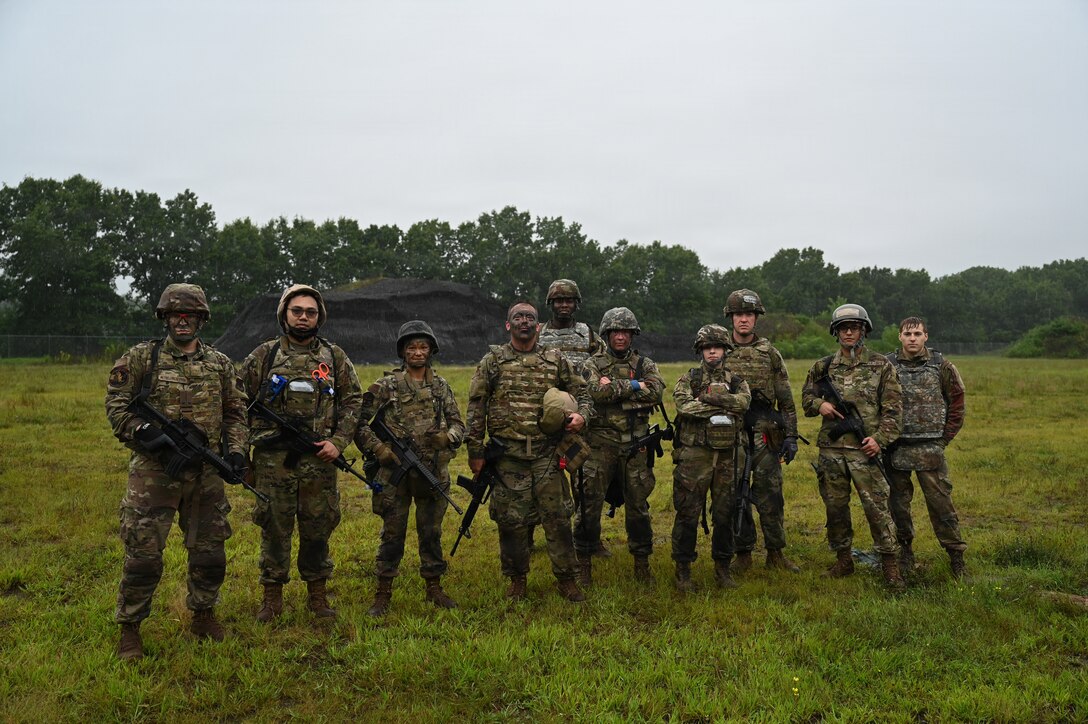 Tier 3 and Tier 2 Tactical Combat Casualty Care (TCCC) Airmen smile for a picture at Barnes Air National Guard Base, Westfield, Mass., August 23, 2026. Airmen were given a certificate for the successful completion of the Tier 2 TCCC course. (U.S. Air National Guard photo by Airman 1st Class Ellen Ozkaptan)