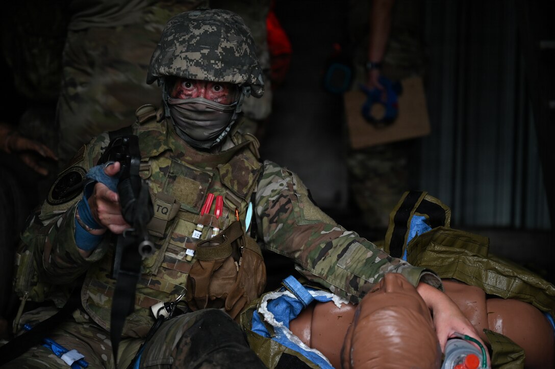 U.S. Air Force Maj. Lindsey Whelan, a Critical Care Air Transport Team (CCATT) Airmen from the 157th Air Refueling Wing, maintains the security during the course’s capstone event at Barnes Air National Guard Base, Westfield, Mass., August 23, 2026. The course was held August 15-23. (U.S. Air National Guard photo by Airman 1st Class Ellen Ozkaptan)