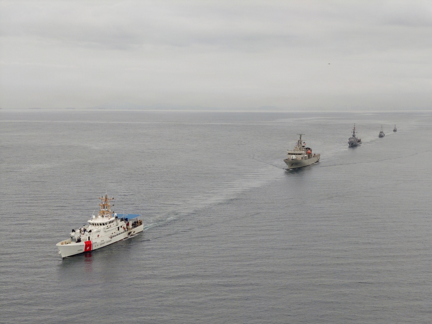 From left to right, U.S. Coast Guard fast response cutter USCGC Robert Ward (WPC 1130), Mexican navy ARM Jalisco, Ecuadorian navy BAE Loja, Colombian navy coastal patrol vessel ARC Isla Gorgona, and the Panamanian National Aeronaval Service Panquiaco (P-301) perform a formation sailing exercise in the Pacific Ocean near Panama, during PANAMAX 2026, Aug. 6, 2026.