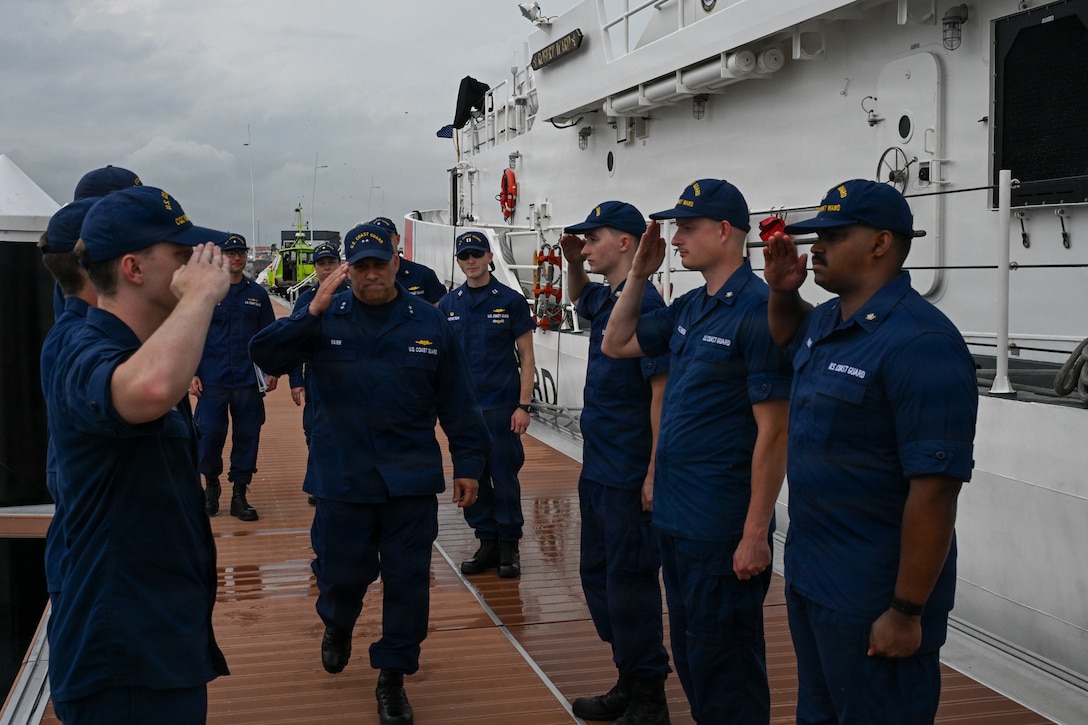 Deputy Commander of U.S. Coast Guard Atlantic Area Rear Adm. John Vann is saluted by sideboys before a tour of the USCGC Sentinel-class Robert Ward (WPC-1130) in Panama, Aug. 12, 2026.
