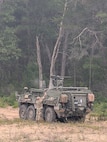 A Montana Army National Guard soldier assigned to the 631st Chemical Company inspects a Stryker vehicle during the Northern Strike 26-2 exercise at Camp Grayling, Michigan, in August 2026.