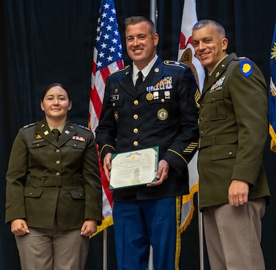 Sgt. 1st Class Coire Reel of Sparta, Illinois, was awarded the Physical Fitness award for Illinois Army National Guard Officer Candidate School Class 71-26.