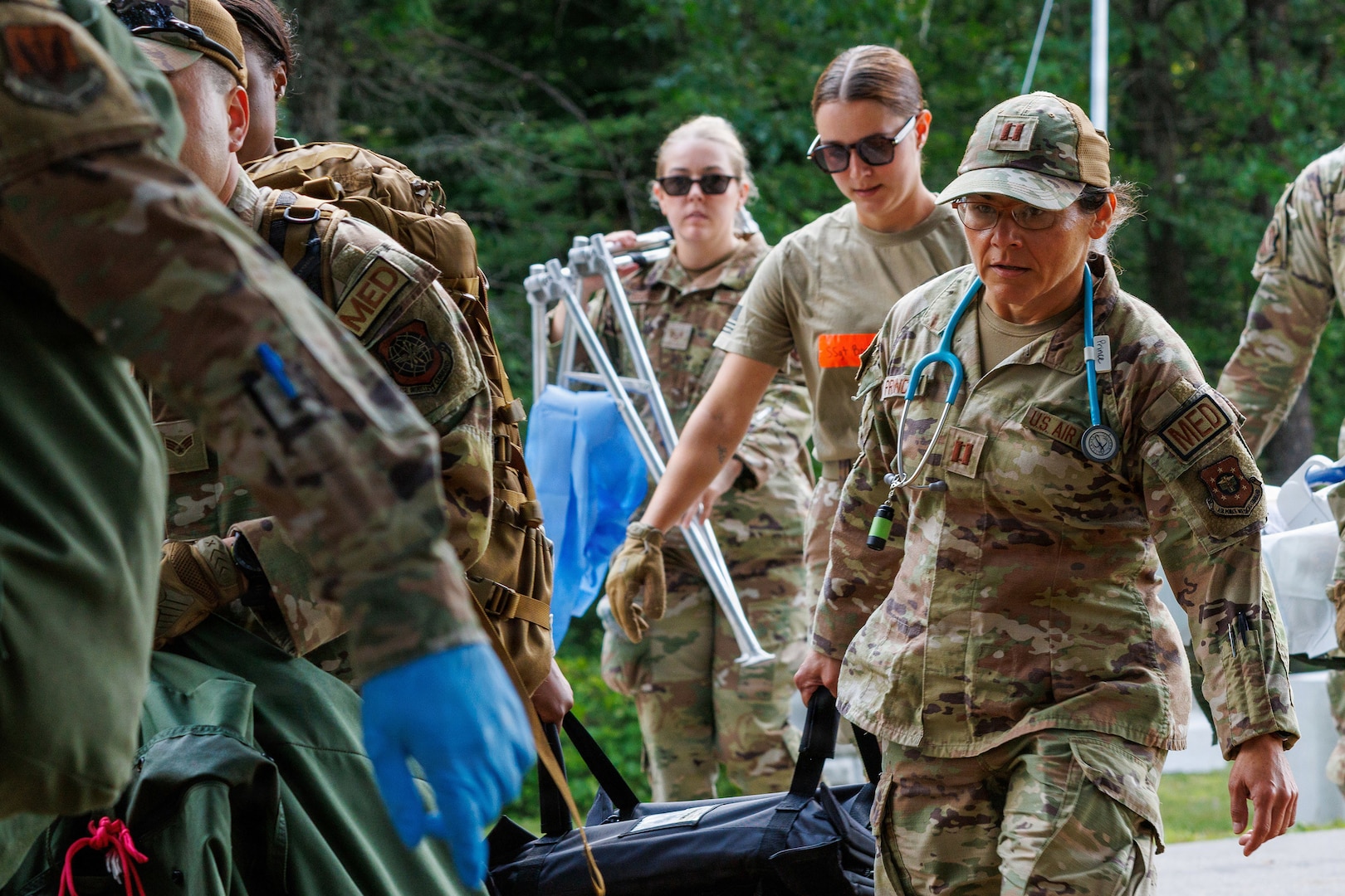 Air National Guard medical personnel move patients to a hardened shelter during Exercise Northern Strike 26-2 at Alpena Combat Readiness Training Center, Michigan, Aug. 10, 2026.