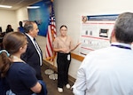 JOINT BASE SAN ANTONIO-FORT SAM HOUSTON (Aug. 11, 2026) Arleen Hidalgo Morales, of Moca, Puerto Rico, an intern assigned to Naval Medical Research Unit (NAMRU) San Antonio, presented research on the evaluation sterilization efficacy of a portable sterilization unit at reduced cycle times at the Battlefield Health and Trauma Research Institute. Hidalgo Morales, a U.S. Army first lieutenant in the Puerto Rico National Guard, earned her master’s in Bioengineering from University of Puerto Rico Mayaguez Campus. She is participating in the Office of Naval Research’s Naval Research Enterprise Internship Program (NREIP). NREIP gives academically talented college students, graduating seniors, and graduate students pursuing STEM careers the opportunity to learn about Naval research and technology while receiving first-class mentoring by top scientists and engineers. NAMRU San Antonio, part of Navy Medicine Research & Development, conducts gap-driven combat casualty care, craniofacial, and directed energy research in support of Navy, Marine Corps and joint U.S. warfighter health readiness and lethality while engaged in routine and expeditionary operations. Navy Medicine’s 44,000+ talented and ready forces optimize health readiness, deliver quality healthcare, and provide global expeditionary medical support to warfighters. (U.S. Navy Photo by Burrell Parmer/Released)