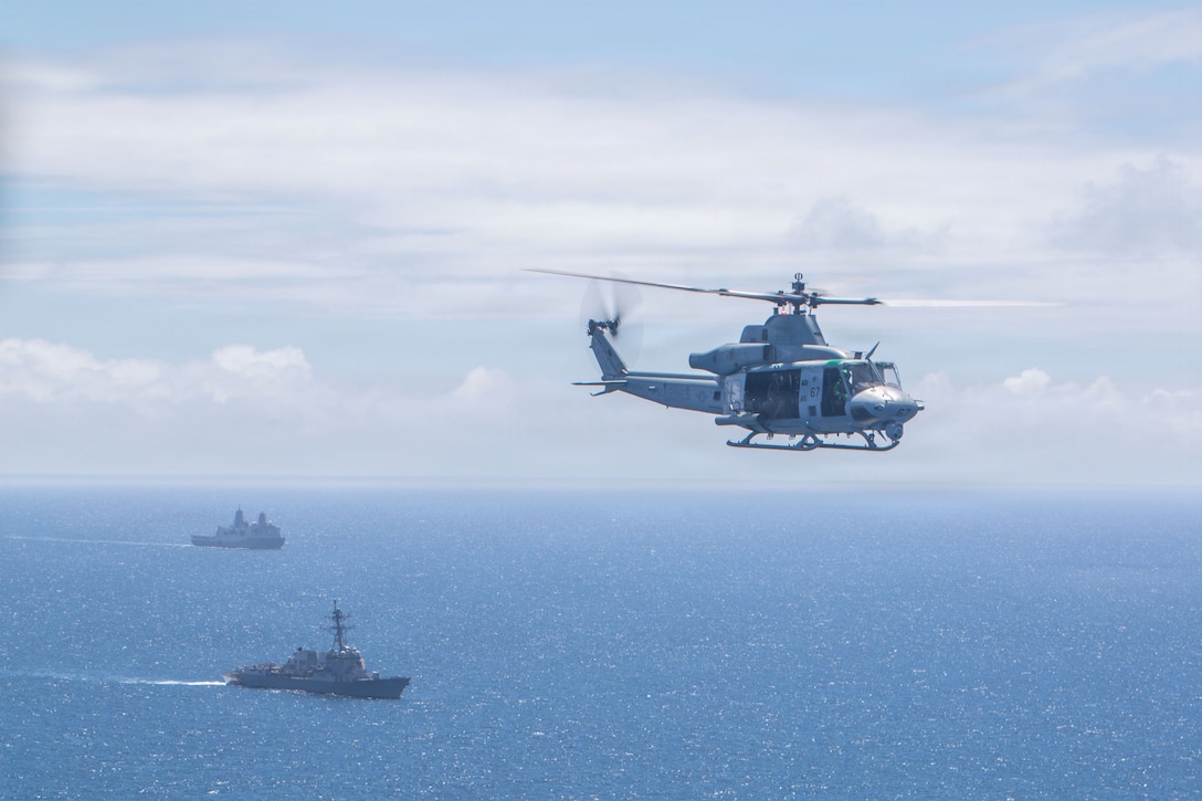 A U.S. Marine Corps UH-1Y Venom with Marine Medium Tiltrotor Squadron (VMM) 365 (Reinforced), Littoral Combat Force-24, flies over the Pacific Ocean during a Maritime Interdiction Operation Full Mission Profile rehearsal Aug. 21, 2026. U.S. military forces are deployed to the U.S. Southern Command area of responsibility in support of Joint Task Force Western Hemisphere, Department of War-directed operations, and the President's priorities to disrupt illicit drug trafficking, deter malign actors and protect the homeland through continuous presence. (U.S. Marine Corps photo)