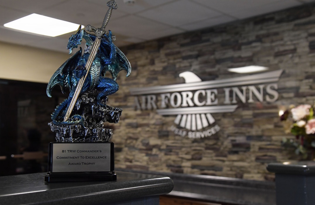 A dragon trophy is on display.