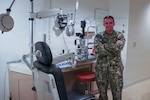 Lt. Cmdr. Skyler Williams, assigned to U.S. Navy Medicine Readiness Training Command (NMRTC) Okinawa, stands in an optometry exam room at U.S. Naval Hospital Okinawa, Japan, May 21, 2026. Williams won the Define-Measure-Analyze-Improve-Control (DMAIC) category of the 2026 Naval Medical Forces Pacific Continuous Process Improvement (CPI) Project Competition for his work “Reduce Glasses Waste and Improve Force Vision Readiness”. (U.S. Navy photo by Petty Officer 1st Class Trey Fowler)