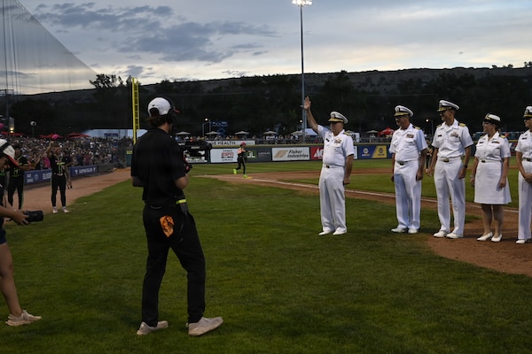 BILLINGS, Mont. (Aug. 22, 2026) – U.S. Navy Rear Adm. Matthew Case, acting Surgeon General and acting chief, U.S. Navy Bureau of Medicine and Surgery,  joins U.S. Navy Sailors from Navy Medicine and the Nimitz-class aircraft carrier USS Harry S. Truman (CVN 75) at the Savannah Bananas baseball game during Billings Navy Week, Aug. 22. Navy Medicine's 44,000+ talented and ready forces optimize health readiness, deliver quality healthcare, and provide global expeditionary medical support to warfighters. (U.S. Navy photo by Violet Gruber)