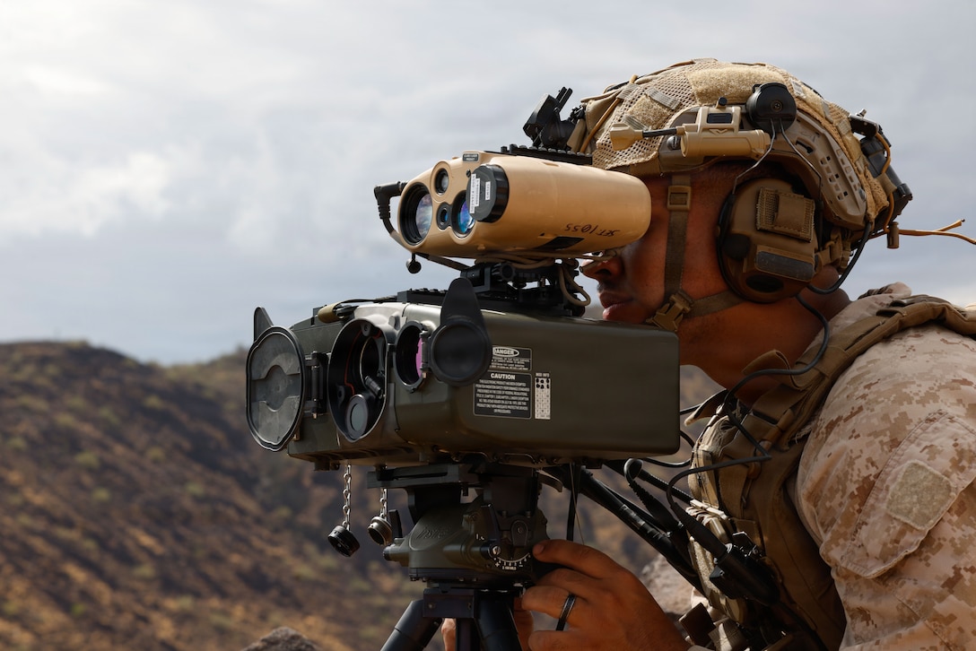 U.S. Marine Corps Cpl. Curtis Jeffress, a fire support Marine with 1st Air Naval Gunfire Liaison Company, I Marine Expeditionary Force Information Group, observes key terrain during a terminal attack control training event at Barry M. Goldwater Range, Arizona, August 11, 2026.