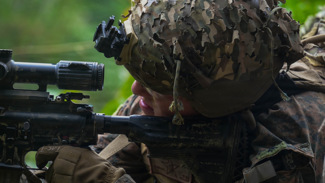 U.S. Marine Corps Lance Cpl. Miguel Sepulveda, a grenadier with 1st Battalion, 5th Marine Regiment, Marine Rotational Force – Darwin 26, aims in a point-man reaction course during Exercise DELAYEN 26 in Tahiti, French Polynesia, Aug. 21, 2026.