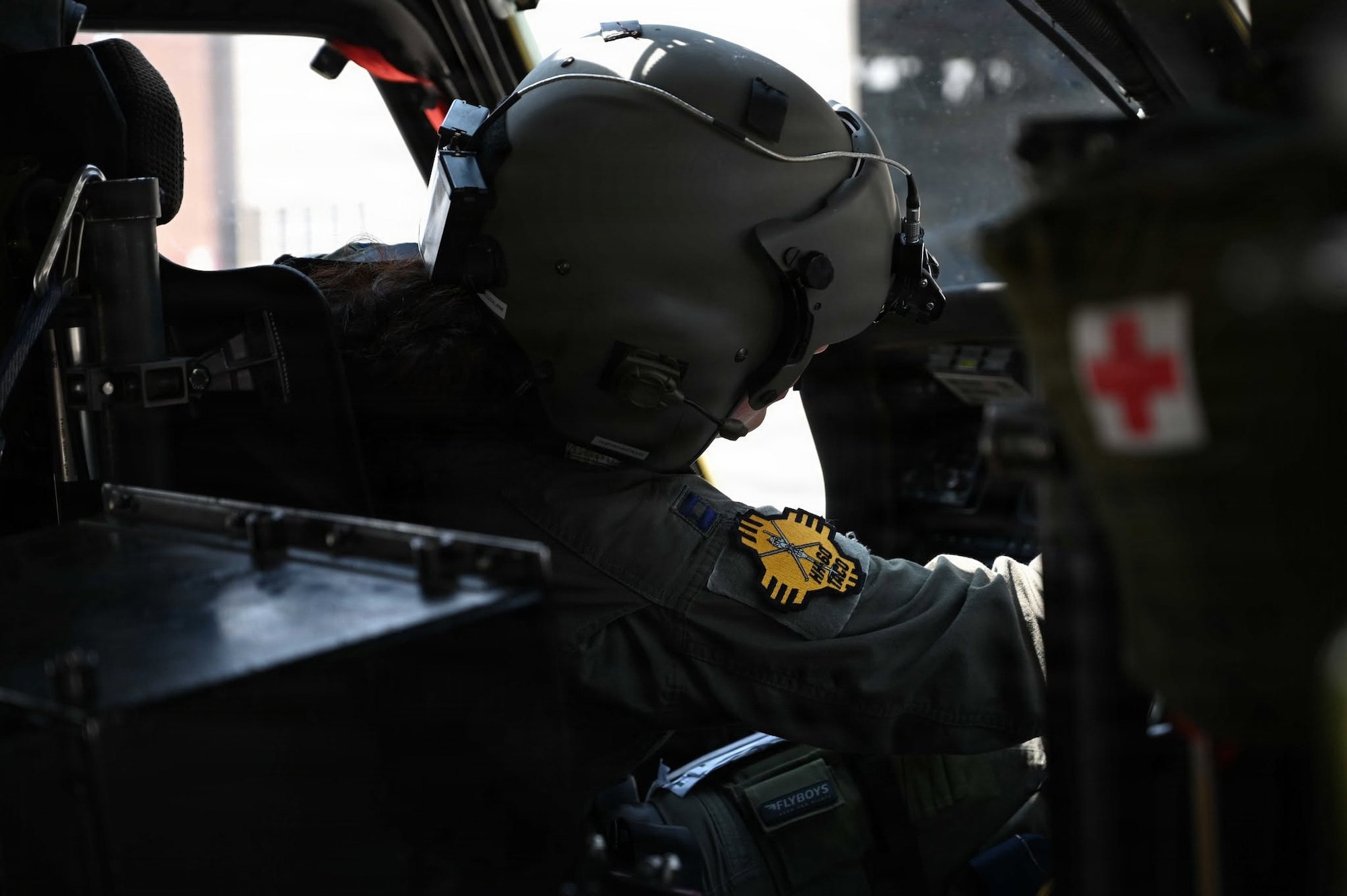 Lt. Col. Danielle Youngberg, HH-60G Pilot, 150th Special Operations Wing, prepares for the final New Mexico Air National Guard flight on the HH-60G Pave Hawk
