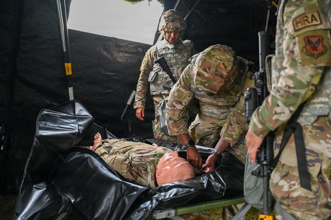 U.S. Air Force Airmen with the 104th Personnel Flight prepare a simulated casualty for preservation and transfer during a Combat Readiness Exercise at Westover Air Reserve Base, Chicopee, Mass., Aug. 23, 2026. Air Force Personnel Airmen mainly handle personal accountability when on deployment, but that also includes accountability for fallen Airmen, identifying them and their affects, and preserving them for dignified transfer to Air Force Mortuary Affairs at Dover AFB. (U.S. Air National Guard photo by Airman 1st Class Elijah Harris)