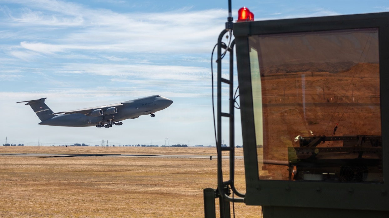 Aircraft flying low over the runway