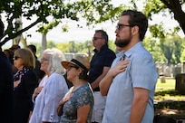 Members of the public render honors as the Maryland Society, Sons of the American Revolution Color Guard posts the colors during a Battle of Bladensburg Wreath-Laying Ceremony at Historic Congressional Cemetery in Washington, D.C., Aug. 24, 2026. The ceremony honored members of the D.C. Militia who answered the call to defend the nation’s capital during the Battle of Bladensburg in 1814 and recognized the enduring legacy of the Citizen-Soldier.