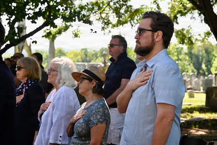 Members of the public render honors as the Maryland Society, Sons of the American Revolution Color Guard posts the colors during a Battle of Bladensburg Wreath-Laying Ceremony at Historic Congressional Cemetery in Washington, D.C., Aug. 24, 2026. The ceremony honored members of the D.C. Militia who answered the call to defend the nation’s capital during the Battle of Bladensburg in 1814 and recognized the enduring legacy of the Citizen-Soldier.