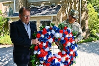 Mark Hudson, Executive Director of Historic Congressional Cemetery, and U.S. Army Brig. Gen. Leland D. Blanchard II, Commanding General (Interim) of the D.C. National Guard, lay a wreath at the grave of U.S. Army Pvt. Andrew Coyle during a Battle of Bladensburg commemoration at Historic Congressional Cemetery in Washington, D.C., Aug. 24, 2026. The Maryland Society, Sons of the American Revolution Color Guard then rendered a ceremonial volley honoring the Citizen-Soldiers who answered the call to defend the nation’s capital in 1814.