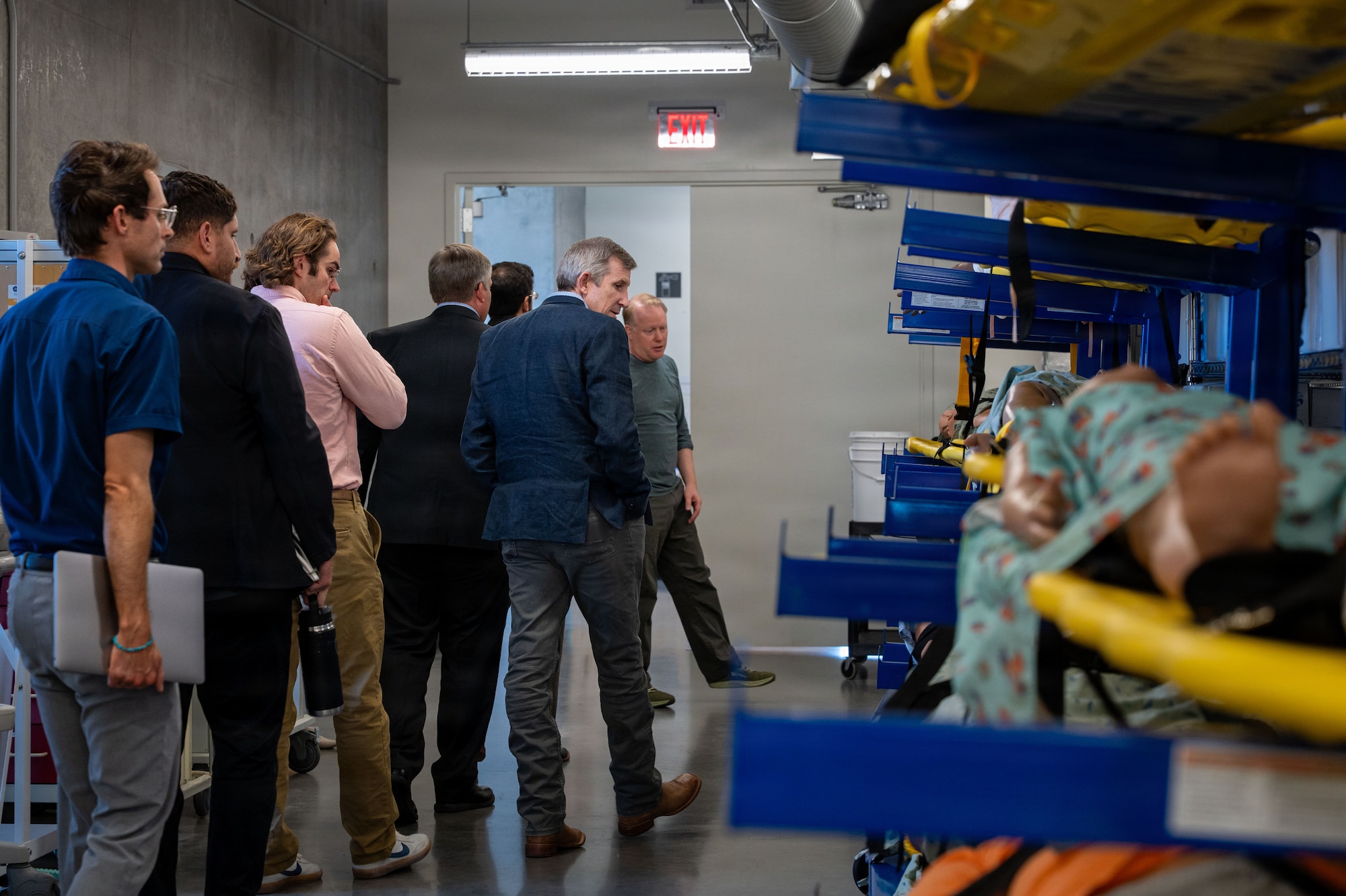 Davis-Monthan Air Force Base personnel and local community partners familiarize themselves with the assortment of manikins utilized during a tour of the University of Arizona’s Arizona Simulation Technology and Education Center (ASTEC) at Tucson, Arizona, July 29, 2026. DM’s pararescuemen and emergency responders from DM and the local community use ASTEC resources to increase their medical response capabilities. (U.S. Air Force photo by Senior Airman Jasmyne Bridgers-Matos)