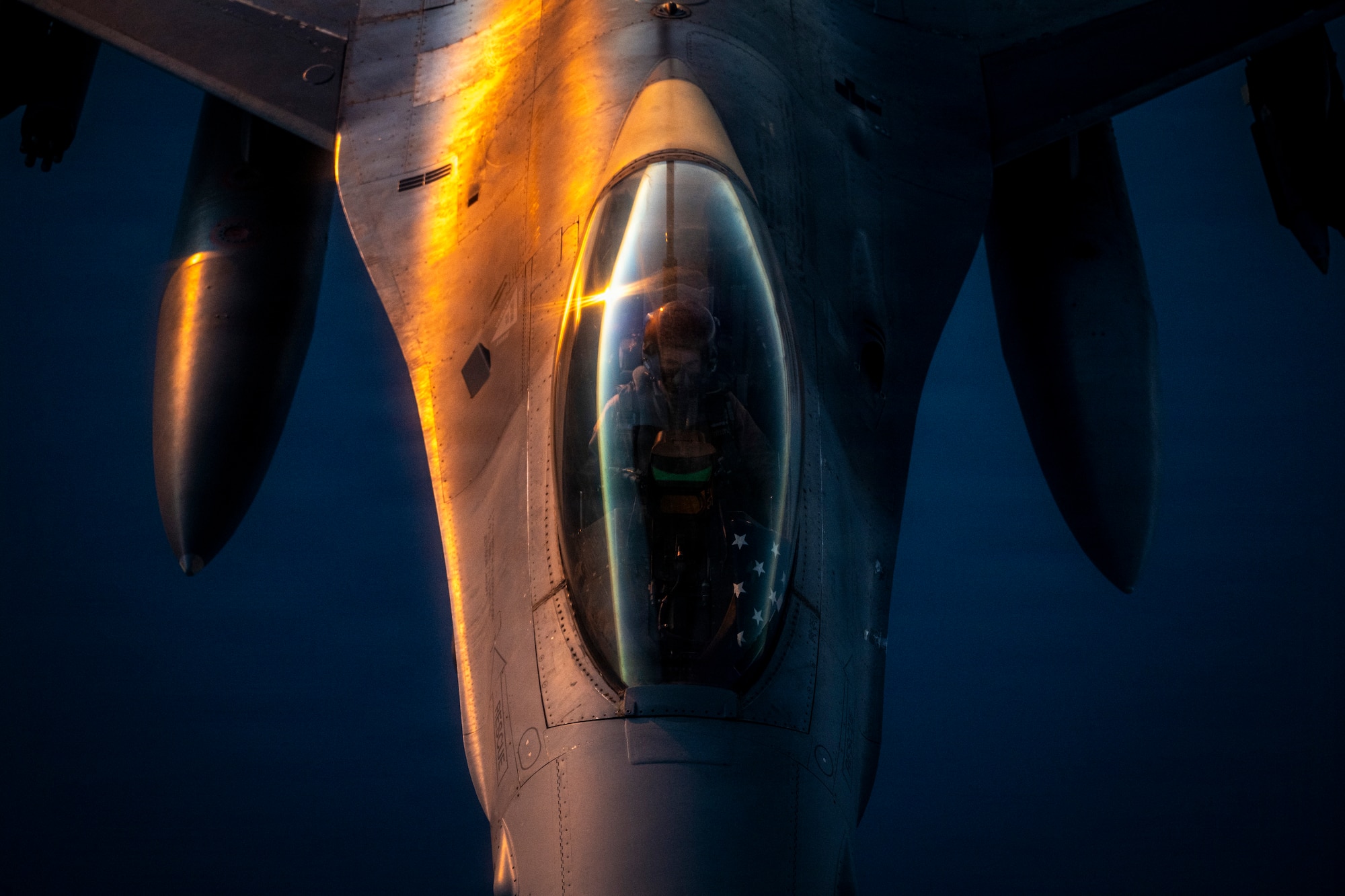 A U.S. Air Force F-16 Fighting Falcon aircraft receives fuel from a KC-135 Stratotanker aircraft in the U.S. Central Command area of responsibility.