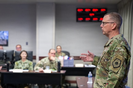 Gen. Gregory Guillot, commander of North American Aerospace Defense Command (NORAD) and U.S. Northern Command (USNORTHCOM), speaks to senior legal leaders at Peterson Space Force Base, Colorado, during the NORAD and USNORTHCOM Legal Symposium Aug. 20, 2026. The three-day engagement provided an opportunity for collaboration on critical topics, including Arctic Operations, authorities to counter threats from unmanned aerial systems, and legal interoperability. (Department of War photo by Blake Macias)