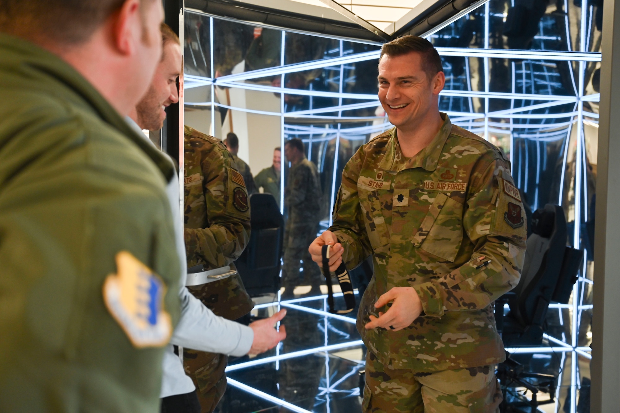 U.S. Air Force Lt. Col. Carsten Stahr, 28th Force Support Squadron commander, steps out of the MindGym after a short demonstration at Ellsworth Air Force Base, South Dakota, Feb. 2, 2024. Lumena hosted a Demo Day for Ellsworth leadership to allow them to experience the MindGym and recommend it to others. (U.S. Air Force photo by Airman 1st Class Brittany Kenney)