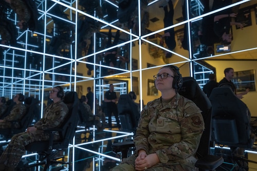 U.S. Air Force Tech. Sgt. Brandie Henrichs, Airman Leadership Instructor, prepares to use the MindGym at Whiteman Air Force Base, Mo., Nov. 20, 2024. The MindGym offers a unique and immersive experience that focuses on reducing stress and promoting relaxation to help improve military readiness. (U.S. Air Force photo by Airman 1st Class Bryce Moore)