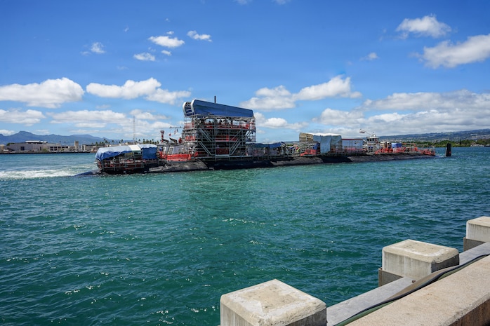 The Virginia-class fast-attack submarine USS North Carolina (SSN 777) transits the waters of Pearl Harbor to the piers following a successful undocking evolution at Pearl Harbor Naval Shipyard and Intermediate Maintenance Facility (PHNSY & IMF) in Pearl Harbor, Hawaii, Aug. 12, 2026.