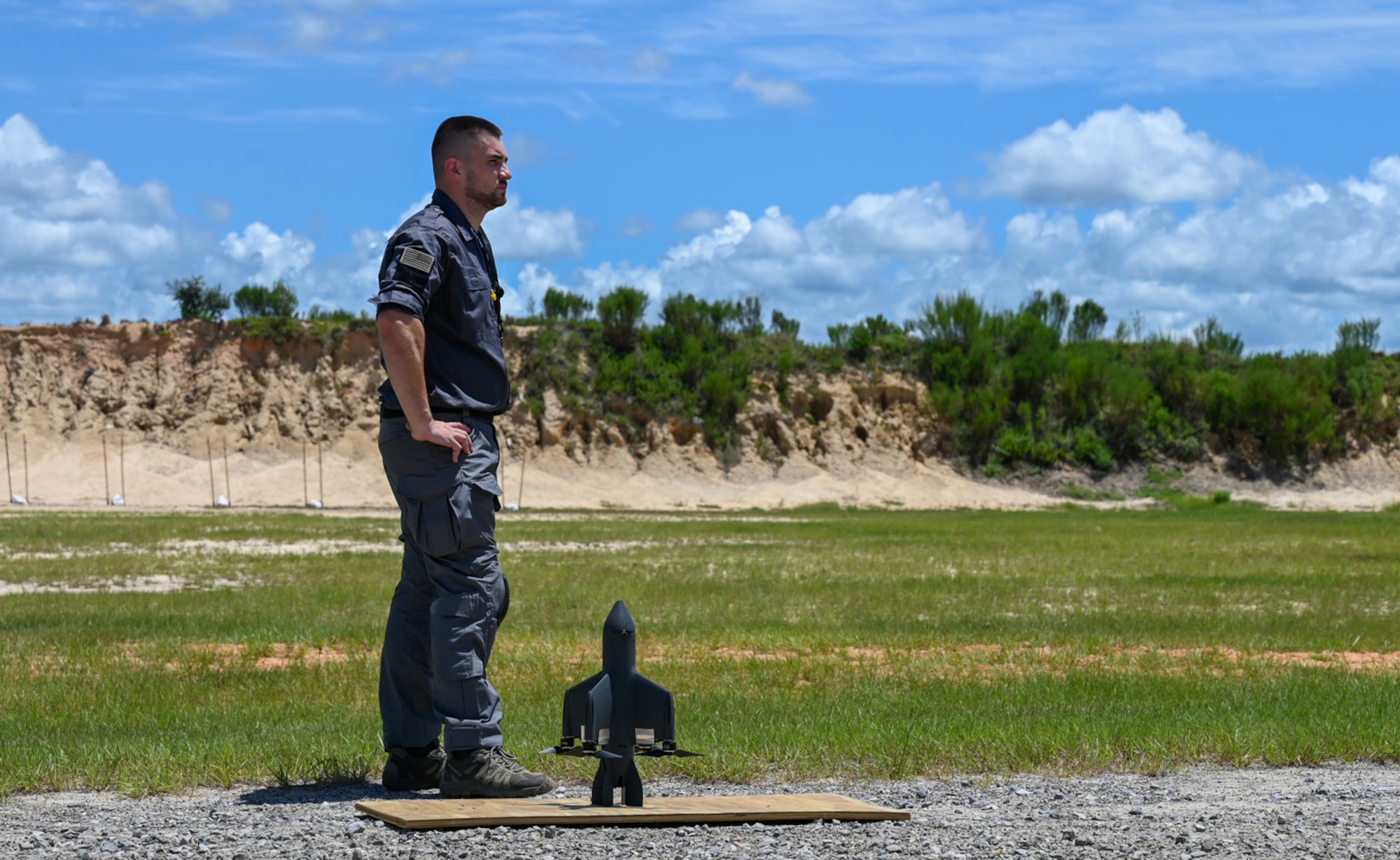 A contractor prepares to fly a first-person view drone during a capabilities demonstration with senior leaders from Air Force Special Operations Command and the 1st Special Operations Wing near Hurlburt Field, Florida, Aug. 7, 2026. The 31st Air Task Force brought together industry experts for a day of conversation and demonstrations related to drone warfare, precision munitions, and unmanned threat detection and mitigation. (U.S. Air Force photo by 2nd Lt. Daniel White)