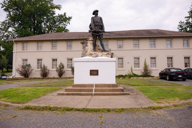 The “Crusading for Right” statue, also known as “Iron Mike,” stands outside Butler Hall at Marine Corps Base Quantico, Virginia, Aug. 16, 2026. The bronze monument, created in 1918 by French sculptor Charles Raphael Peyre, depicts a World War I U.S. Marine holding an M1903 Springfield rifle. (U.S. Marine Corps photo by Lance Cpl. Lynsee Avila-Ramirez)
