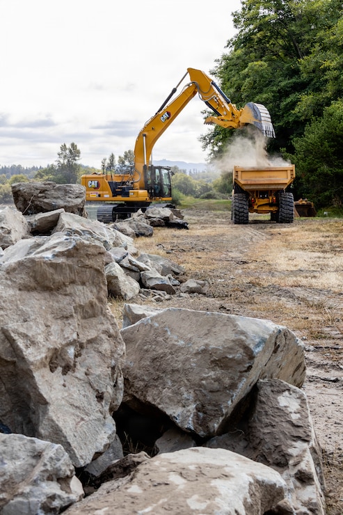 Photo of active construction on a levee site
