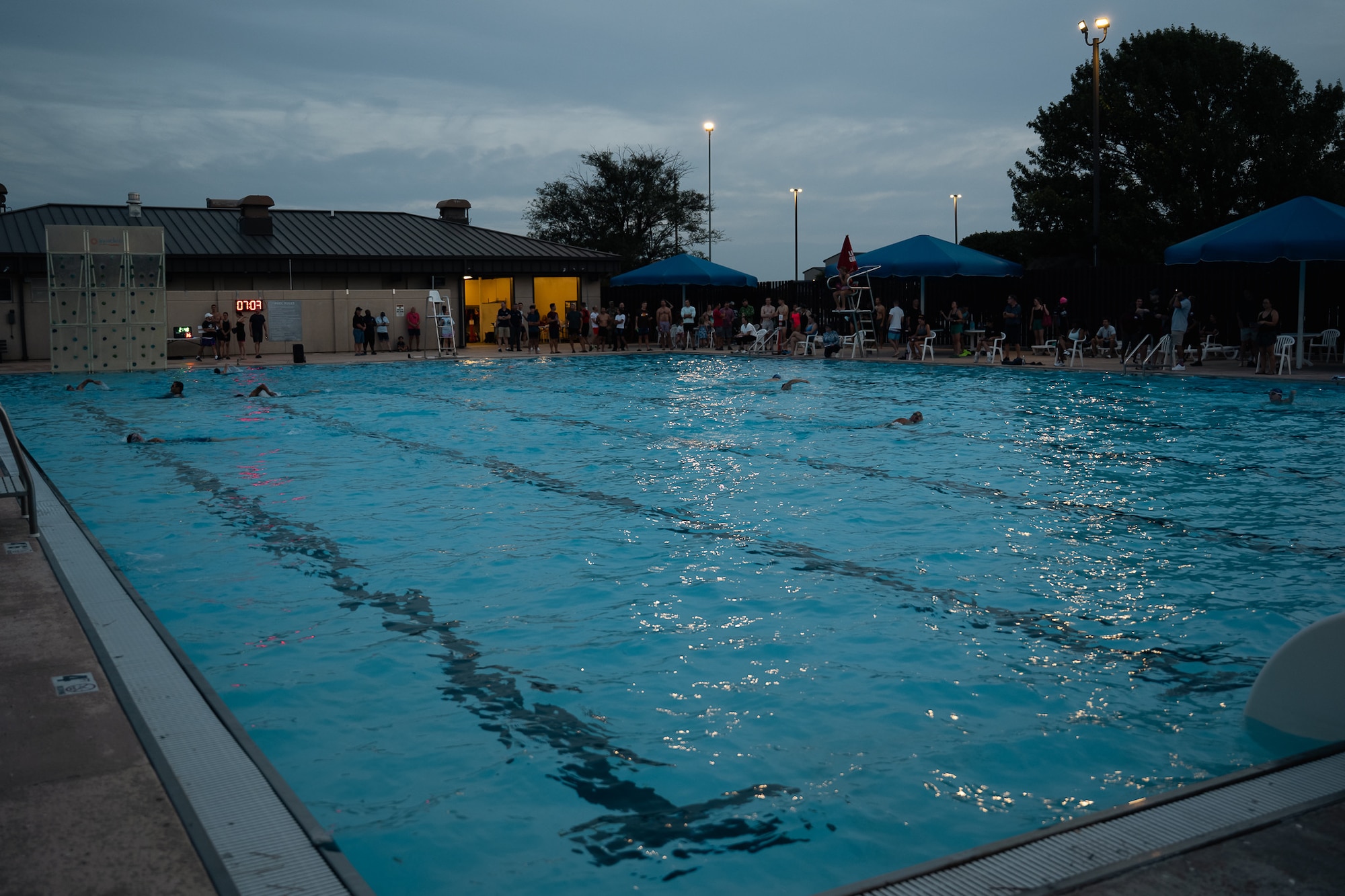 Athletes swim during a sprint triathlon at Altus Air Force Base, Oklahoma, Aug. 22, 2026. Participants began the competition with a 750-meter swim as part of the three-stage event. (U.S. Air Force photo by Senior Airman Jonah Bliss)