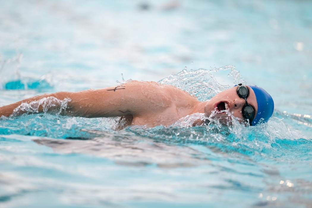 An athlete swims during a sprint triathlon at Altus Air Force Base, Oklahoma, Aug. 22, 2026. The event encouraged participants to pursue personal fitness goals while building camaraderie across the installation community. (U.S. Air Force photo by Senior Airman Jonah Bliss)