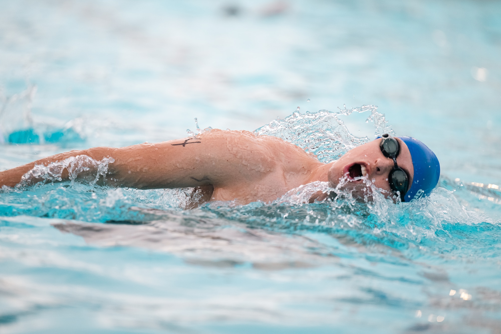 An athlete swims during a sprint triathlon at Altus Air Force Base, Oklahoma, Aug. 22, 2026. The event encouraged participants to pursue personal fitness goals while building camaraderie across the installation community. (U.S. Air Force photo by Senior Airman Jonah Bliss)